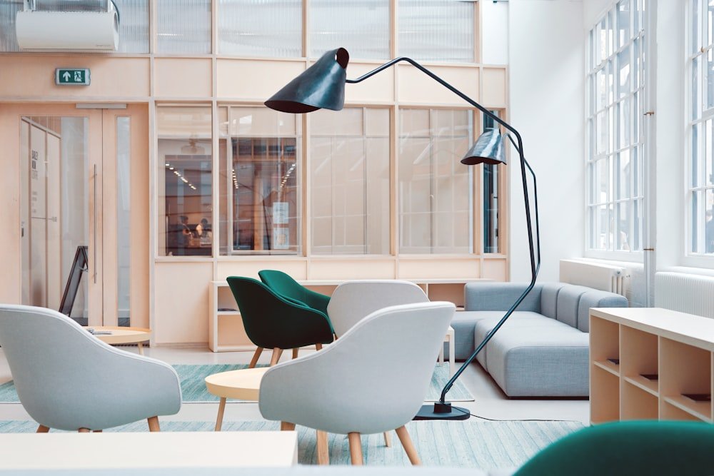 Office interior with lounge seating by Tiwari Interiors, Bhopal